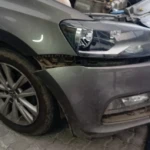 Before Volkswagen front bumper clip repairs.